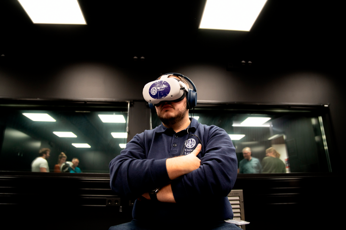 man with VR glasses in lab space
