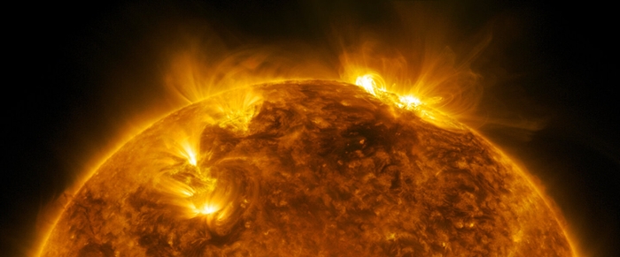 Satellietbeeld van actieve gebieden op de zon, waargenomen met de SDO satelliet.