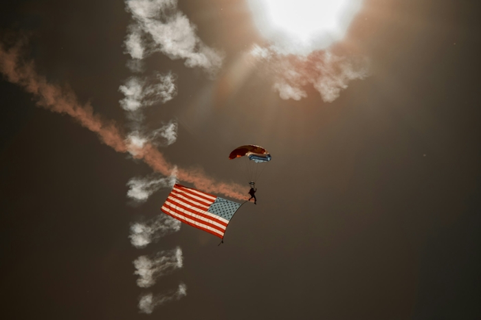 Eric Brehm - Person in Red Parachute Under Cloudy Sky during Daytime