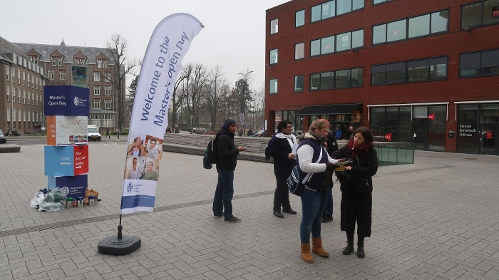 Student Babet points visitors in the right direction and answers questions about her own study programme.