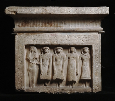 The Stela of Meryptah from Saqqara. The figures are Meryptah and his family. The text asks the living to make offerings for their deceased family members.