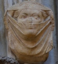 Een middeleeuws beeld met een 'masker'