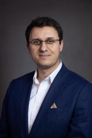 Portrait of Dr. Gëzim Visoka
